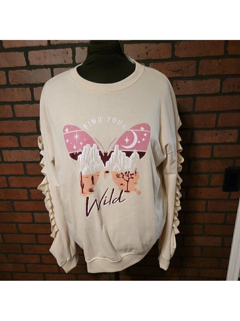 Slit Sleeve Butterfly Sweatshirt. Cream colored size large